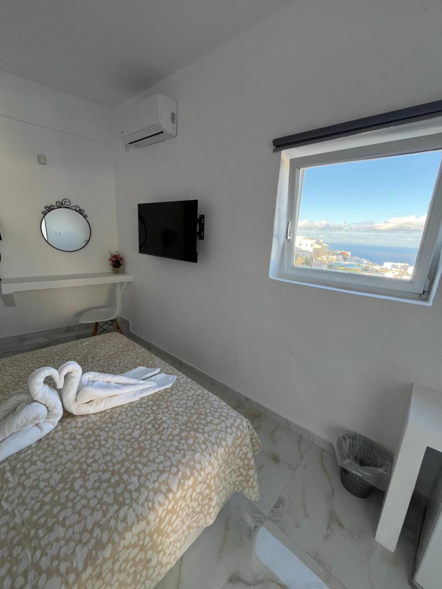 Stella Nomikou Apartments Фиростефани Экстерьер фото